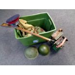 A box containing a large quantity of militaria including helmets, metal ammunition box,