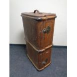 A cane and metal bound trunk