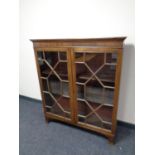 An early 20th century mahogany glazed bookcase