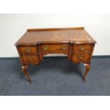 A reproduction Queen Anne style walnut desk CONDITION REPORT: height 80 cm width