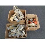 Three boxes containing a collection of Star Wars model parts, imperial walkers,