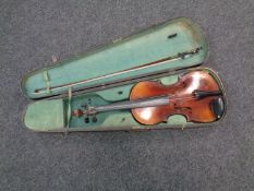 An early 20th century violin with 14" two-piece back, unlabelled, with later bow,
