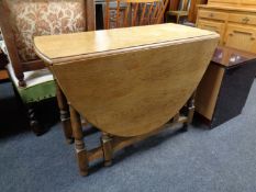 A light oak gateleg table