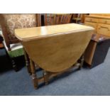 A light oak gateleg table