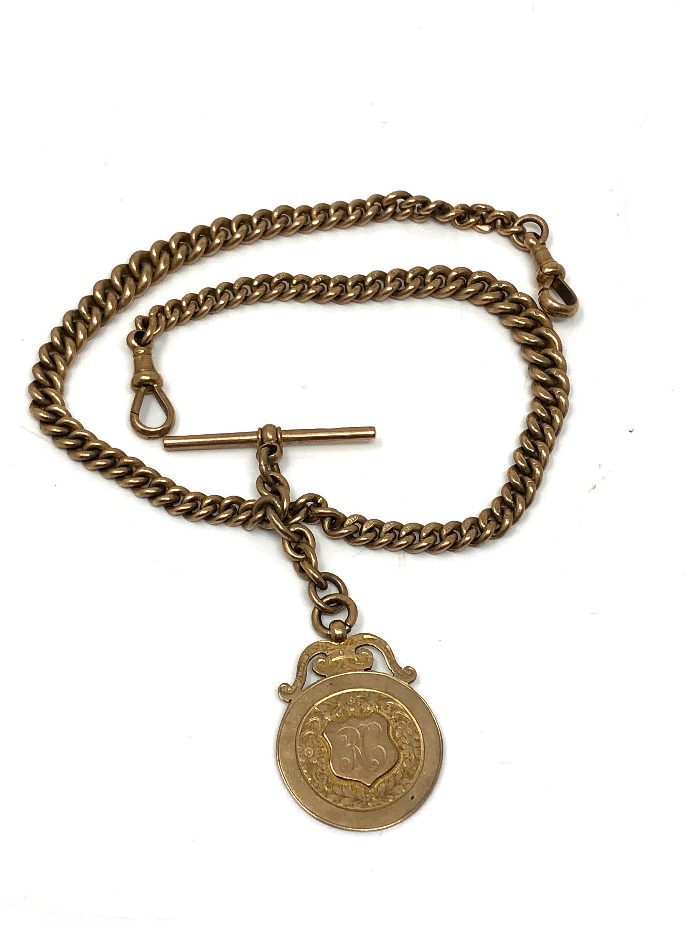 A 9ct gold pocket watch chain with 9ct gold T-bar and 9ct gold fob, weight 54.