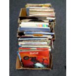 Four boxes containing a large quantity of LP records including Meatloaf, Blondie, Status Quo,