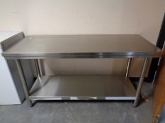 A stainless steel prep table