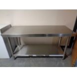 A stainless steel prep table