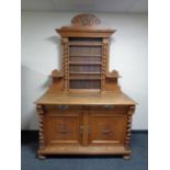 A 19th century oak sideboard with shelf,