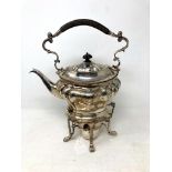 A silver plated spirit kettle on stand with burner