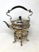 A silver plated spirit kettle on stand with burner