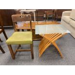 A contemporary folding occasional table and an oak chair