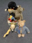 A box containing vintage toys including vintage Paddington Bear,