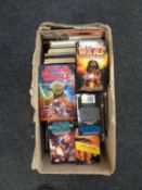 A box containing a collection of Star Wars books