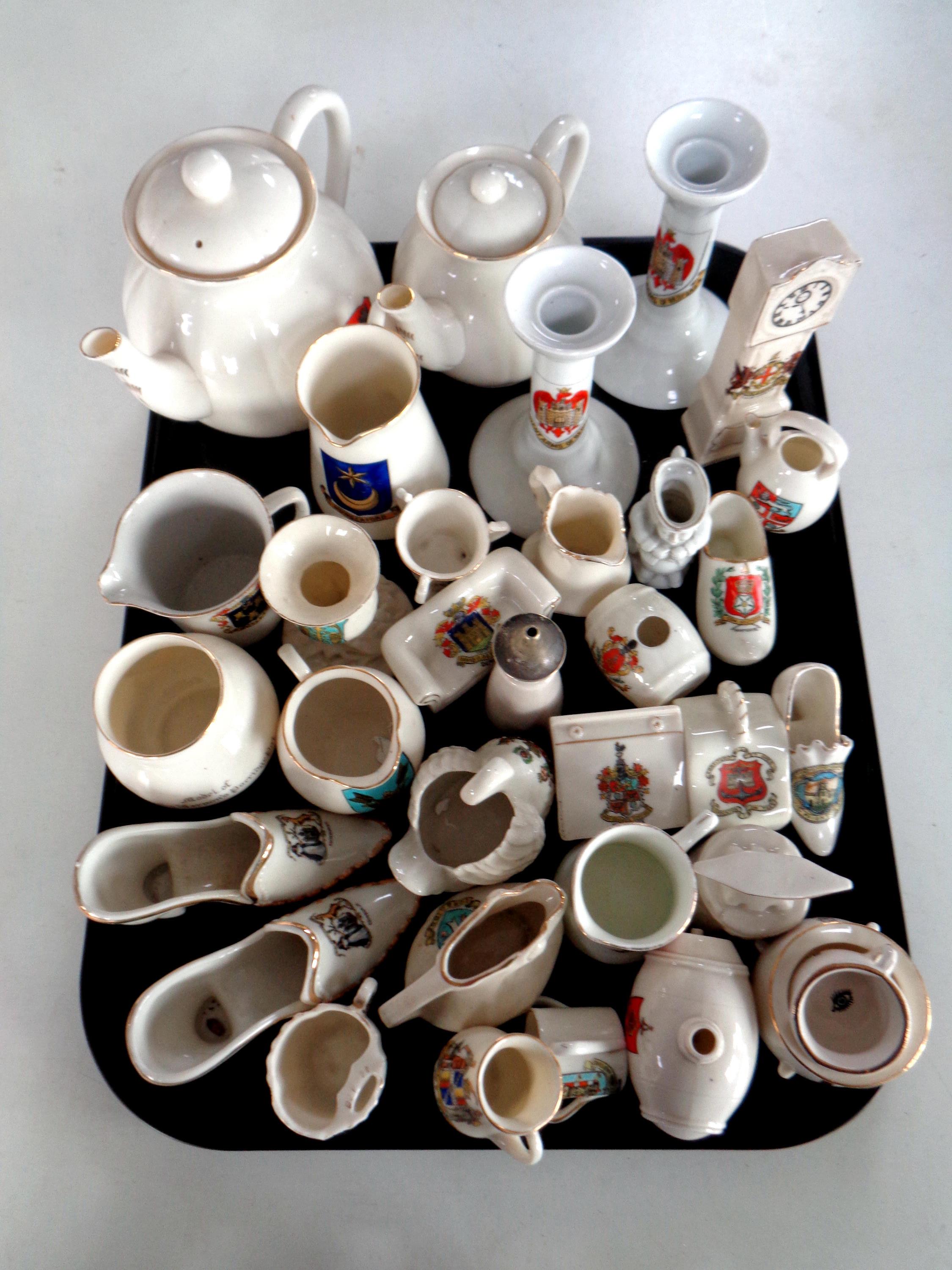 A tray containing a large quantity of crested china