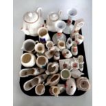 A tray containing a large quantity of crested china