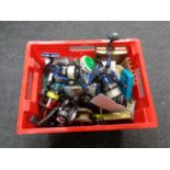 A box of fishing reels,