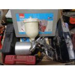A box containing sprayer, soldering kit,