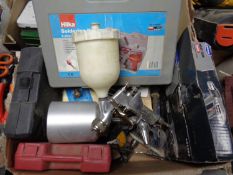 A box containing sprayer, soldering kit,