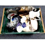 A crate containing silver plated tray, wooden clogs,