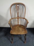 A 19th century elm Windsor chair
