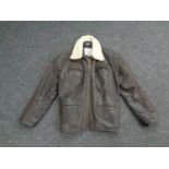 A gent's Proto leather and sheepskin jacket,