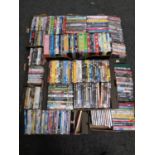 Seven boxes containing a large quantity of DVDs