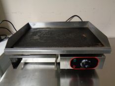 An electric table top griddle