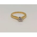 An 18ct gold solitaire diamond ring, approx. 0.2 carat, size N CONDITION REPORT: 3.