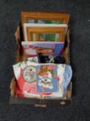 A box containing table linen, costume jewellery,