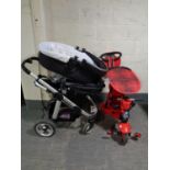 A Smart Trike together with an I Candy Strawberry push chair with carry cot