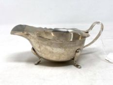 A silver sauce boat, weight 106.