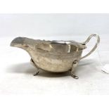 A silver sauce boat, weight 106.