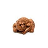 A carved Chinese hardwood netsuke - Mythical sea creature