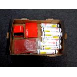 A box containing Firefly high temperature adhesive in tubes,