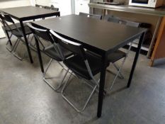 Two cafe tables and eight folding chairs