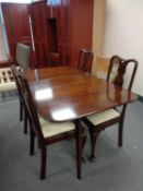 A Queen Anne style drop leaf table and four chairs