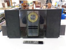 A Bang and Olufsen Beo System 2300 CD player with pair of speakers and a remote control (as found)