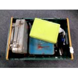 A plastic crate containing a collection of hand tools,