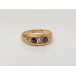 An antique 18ct gold ruby and diamond ring, size M CONDITION REPORT: 4.