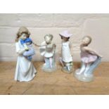 Four Nao figures depicting children (4)