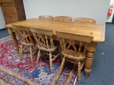 An antique style traditional pine farmhouse table and six pine chairs