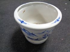 A blue and white Chinese style jardiniere (damaged)