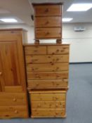 A pine three drawer bedside chest,