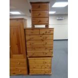 A pine three drawer bedside chest,
