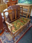 An Edwardian two seater beech salon chair