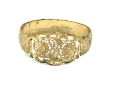 An antique gold plated bangle with expansion clasp