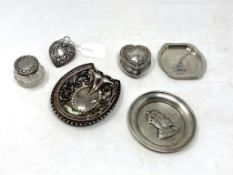 Six items of silver to include three small dishes, heart shaped trinket pot,