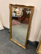 A gilt framed bevelled mirror,