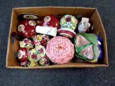 A box of ceramics including Maling storm bowl, china flower posies,